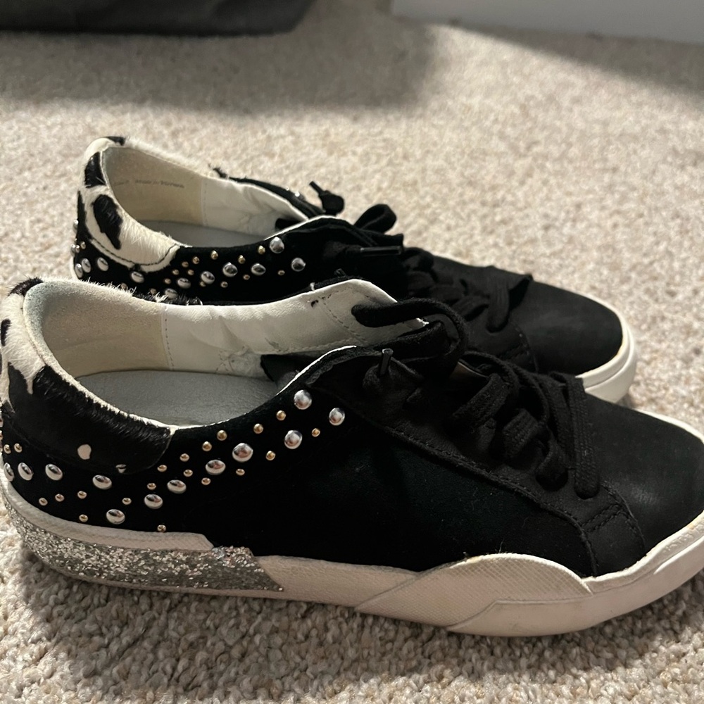 Size 7 Dolce Vita slip on sneakers. Only worn a few times still good condition